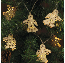 Ljusslinga med ängelmotiv av trä på en julgran