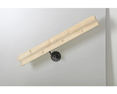 Träledstång monterad på en vägg med fäste