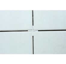 Kakel med kakelkryss för jämna fogar