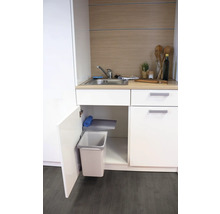 Diskho med öppet underskåp och utdragbar soptunna för köksavfall