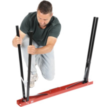 Man monterar ett monteringshjälpmedel för bilglas.