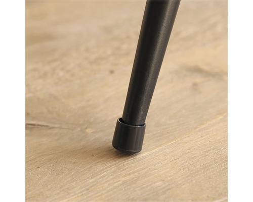 Detaljvy av ett möbelben med golvskydd