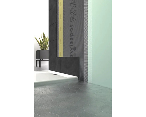 Badrum med duschkabin, väggplattor och SwissPor Board byggskivor