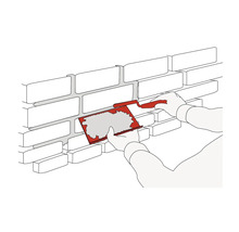 Illustration: Fogar i en tegelvägg fylls med en fogbräda