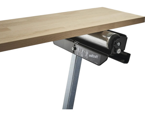 Wolfcraft Logo med materialstöd och arbetsstycke