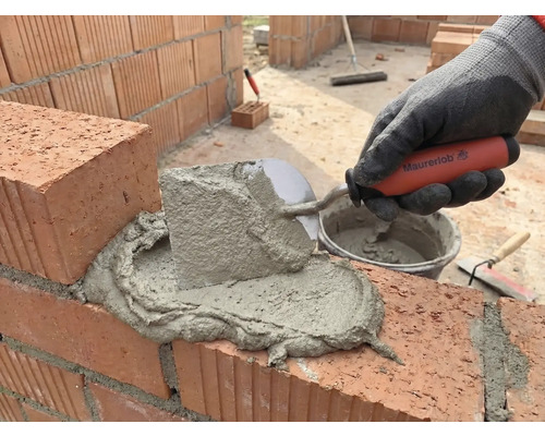 Mura tegelstenar med murslev