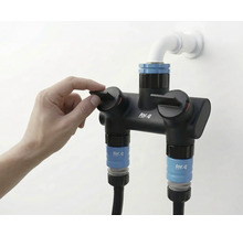 For.q vattenfördelare med hand på regulatorn