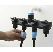 Trädgårdsslangfördelare med fyra utgångar för vattenförsörjning i trädgården