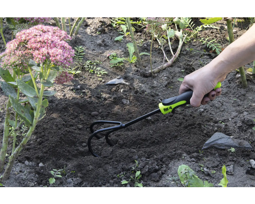 Trädgårdshacka används för jordbearbetning i trädgården.