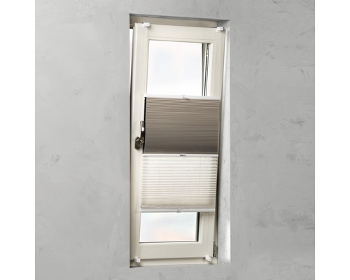 Plisségardin på fönster för ljusreglering