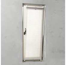 Plisségardin på fönster för ljusreglering