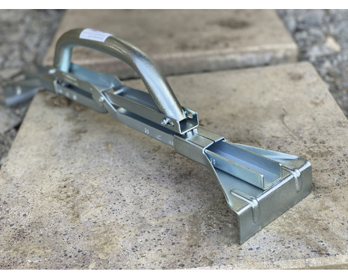 Stenläggartång av metall för att lyfta stenplattor