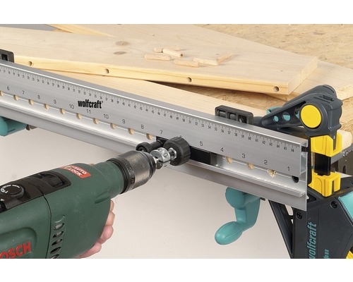Wolfcraft dymlingslist med borrmaskin och arbetsstycke