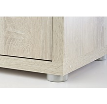 Detaljvy av ett träskåp med fötter