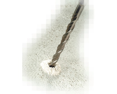 Borren borrar ett hål i en betongyta