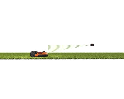 Robotgräsklippare med sensor på grönområde