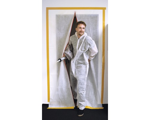 Hantverkare i skyddsdräkt med tätningspistol och dammskyddsdörr