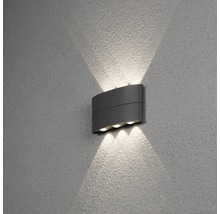 Grå LED utomhusvägglampa på en vägg