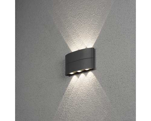 Grå LED utomhusvägglampa på en vägg