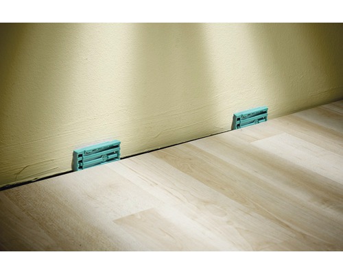 Installationskilar mellan vägg och laminatgolv