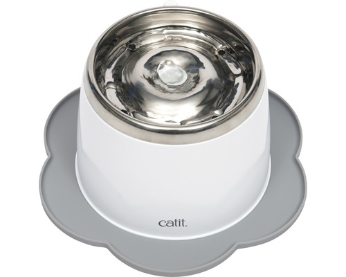 Kattfontän med rostfri stålyta på ett underlag