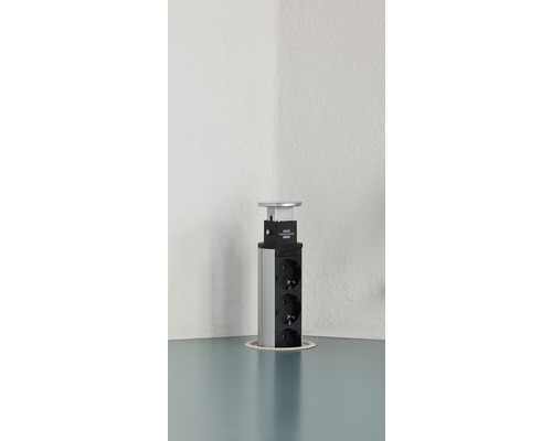 Infälld grenuttag med tre uttag på en bordsskiva