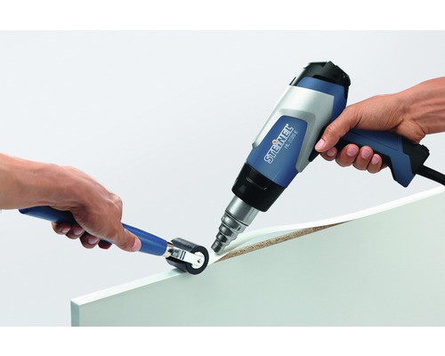 Applicering av varmluftspistol och tryckrulle på en skiva