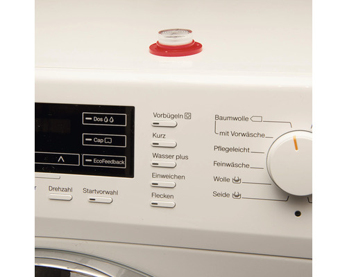 Tvättmaskin med avtagbar påfyllningsstos