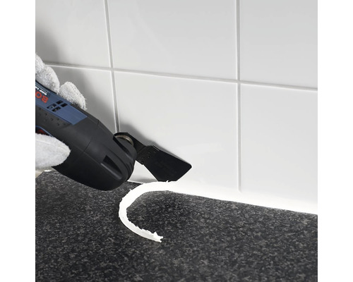 Multifunktionsverktyg som tar bort fogmassa mellan plattorna