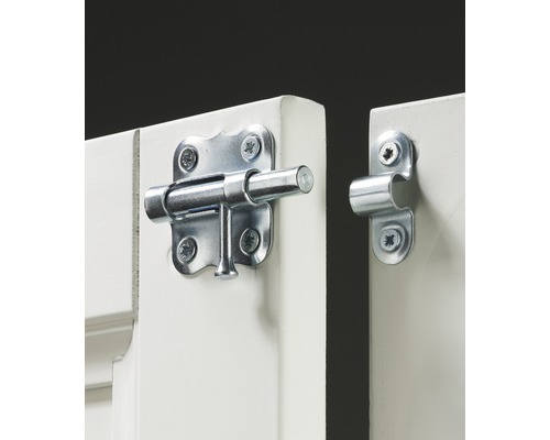 Metallgrind fäst vid en dörr