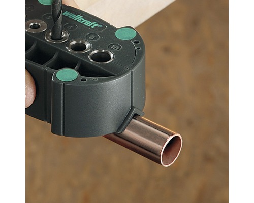 Wolfcraft Logo. Borrmall för rör vid borrning.