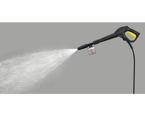 Högtryckstvättspistol i drift med vattenstråle