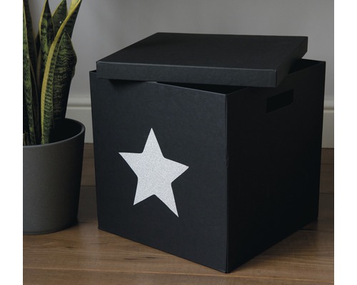 Svart leksakslåda med stjärna och lock