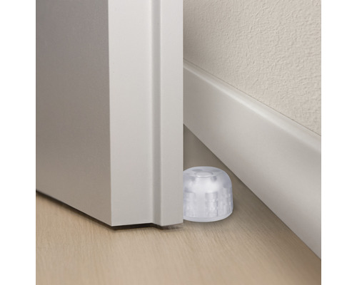 Dörrstopp av plast mellan dörr och vägg