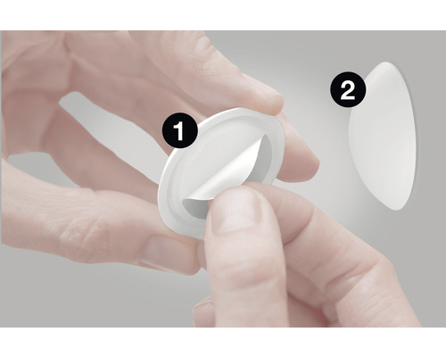 Applicering av en rund självhäftande pad för fastsättning