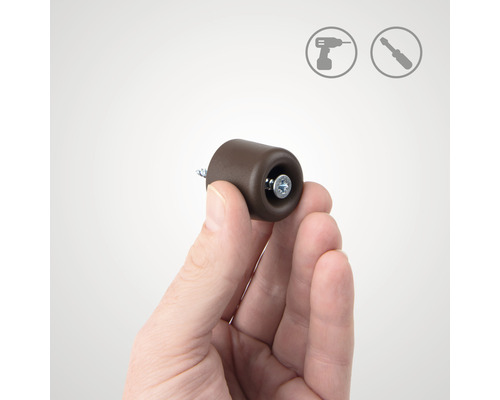 Brun dörrstopp med skruv i en hand