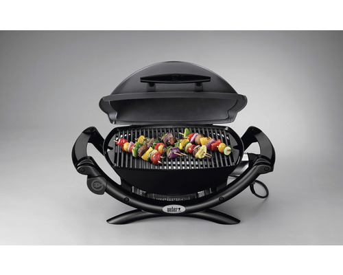 Elektrisk grill med grillad mat på gallret