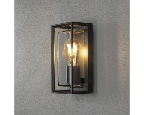 Rektangulär vägglampa av metall och glas med glödlampa