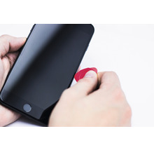 Smartphone reparation med plektrum