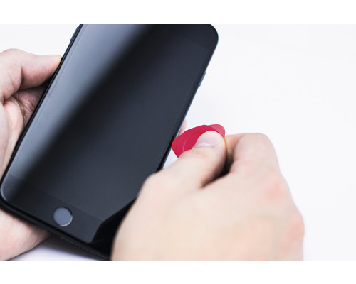 Smartphone reparation med plektrum
