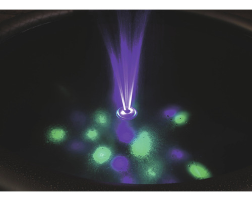 Fontän med vattenspel och belysning