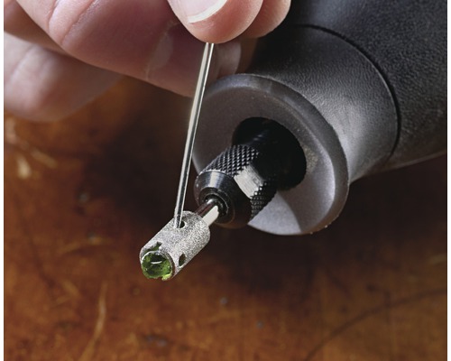 Dremel borr med stenbearbetningstillbehör och rengöringsnål