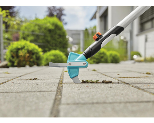 Fogskrapa i användning på gatstenar