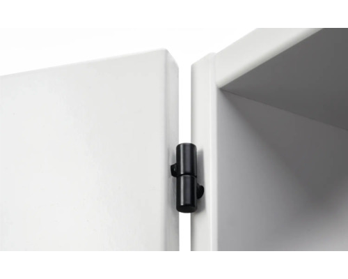 Detaljbild av en gångjärnsanslutning på ett skåp