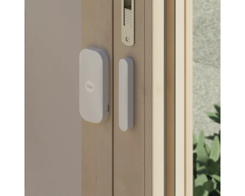 Yale Logo Dörrkontakt med sensor på fönsterramen