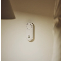 Yale logotyp dörrklocka monterad på vägg