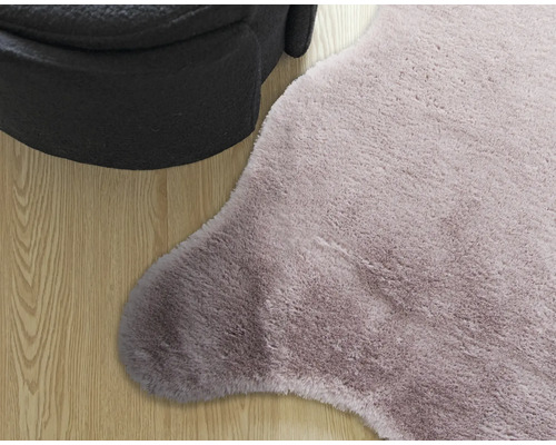 Närbild av en ryamatta och en pall