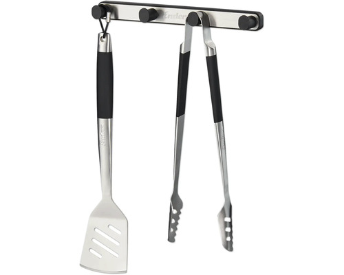 Grillbestickset med stekspade och tång på ett fäste