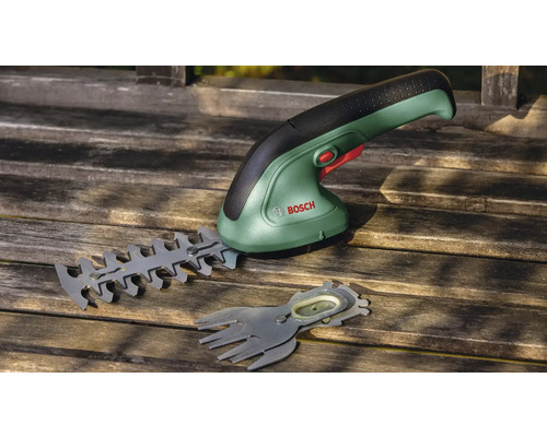 Batteridriven grässax med buskskärare och grässaxblad