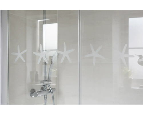Duschkabin med sjöstjärnemotiv och duschblandare